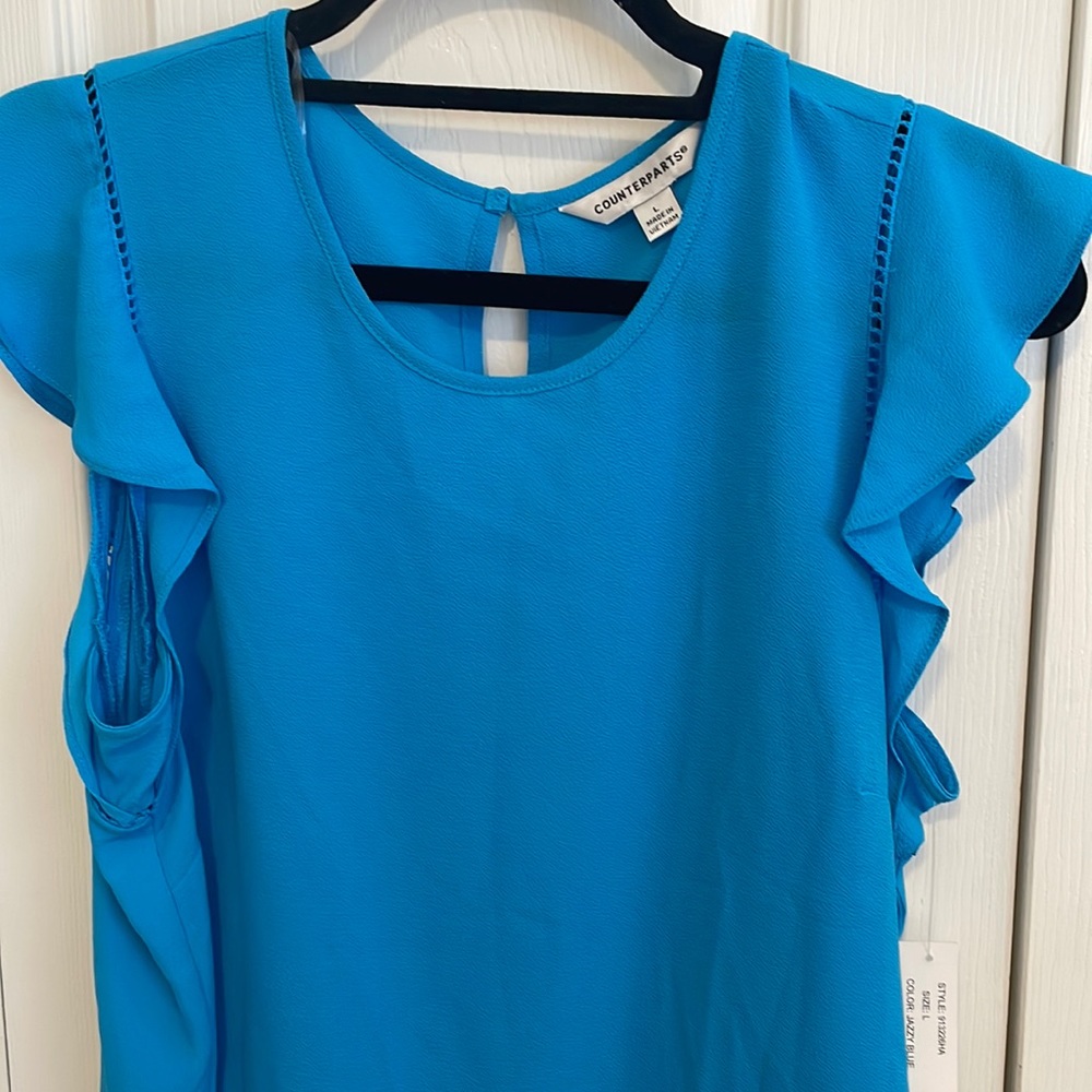 Turquoise ruffle sleeveless top